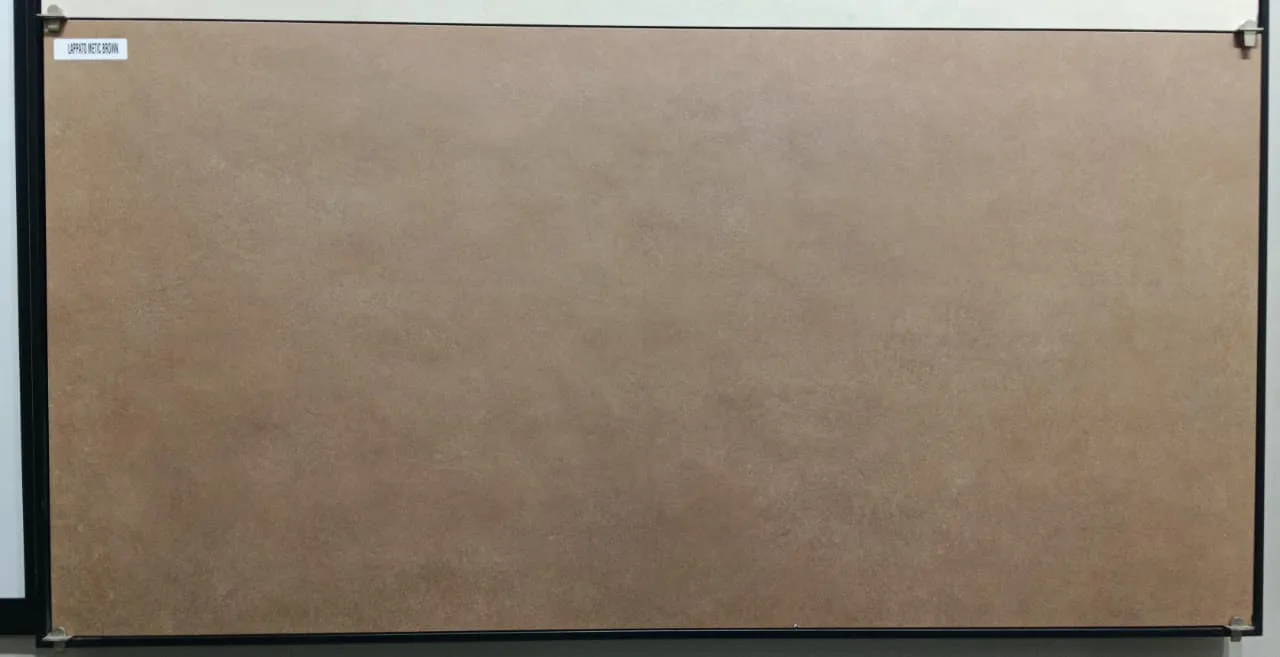 METIC BROWN In a room
